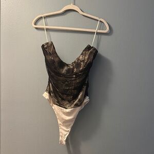 AKIRA Black and Cream Zippered Garment